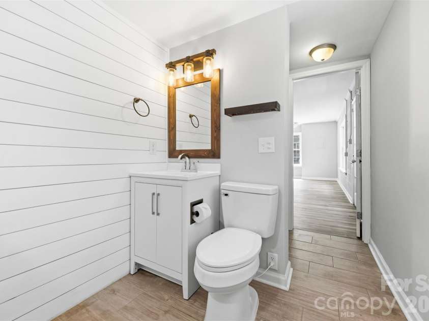 6506 Candlewood Drive, Charlotte, NC 28210.  MLS# CAR4401762, YatesRealty ID 49207. Basement level Full bath with a modern finish