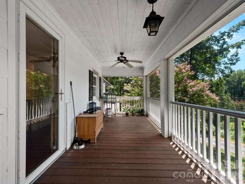 689 Trade Street, Tryon, NC 28782.  MLS# CAR4421132, YatesRealty ID 49209. Upper level screen porch