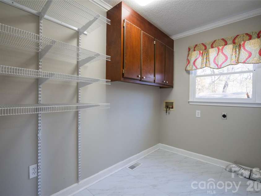 2568 Chelsea Drive, Concord, NC 28025.  MLS# CAR4334565, YatesRealty ID 4921. Laundry Room on Main