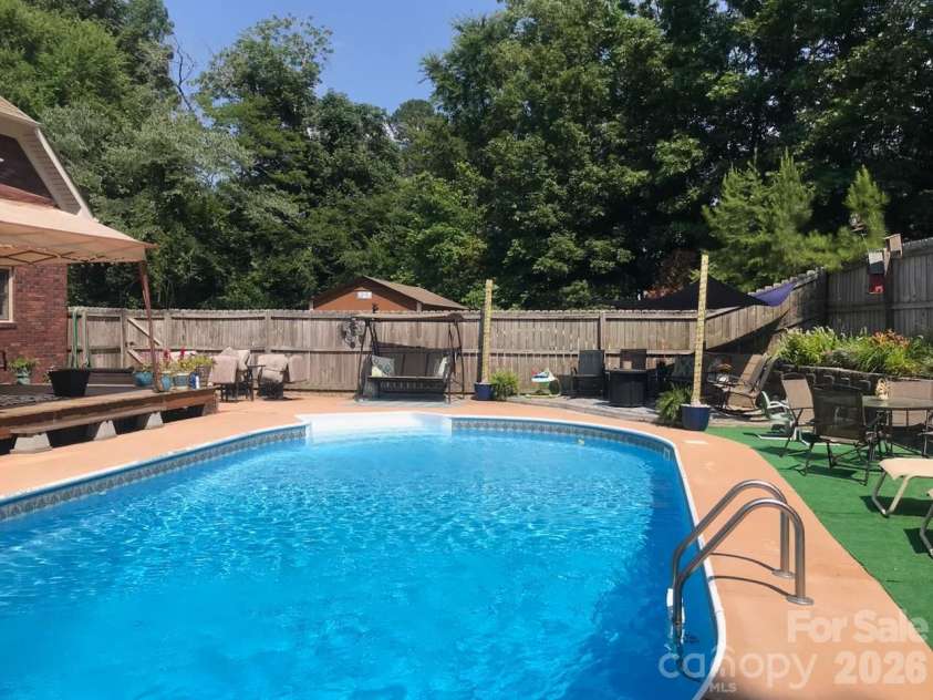 2568 Chelsea Drive, Concord, NC 28025.  MLS# CAR4334565, YatesRealty ID 4921. Recent Summer Views of Pool