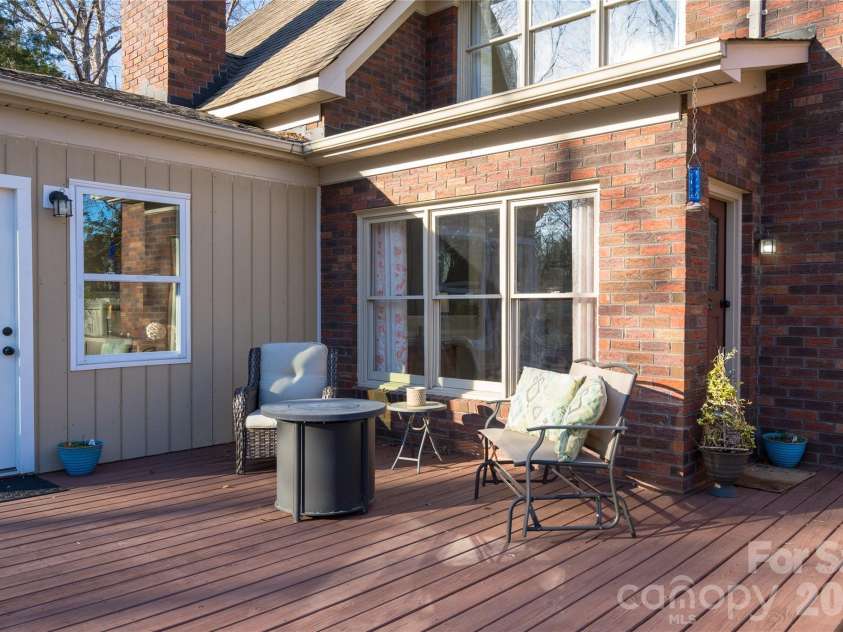 2568 Chelsea Drive, Concord, NC 28025.  MLS# CAR4334565, YatesRealty ID 4921. Relax on the deck