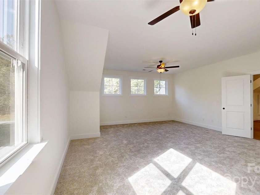 472 Bellingshire Drive, Mt Ulla, NC 28125.  MLS# CAR4292714, YatesRealty ID 4922. Large bonus room upstairs with huge closet