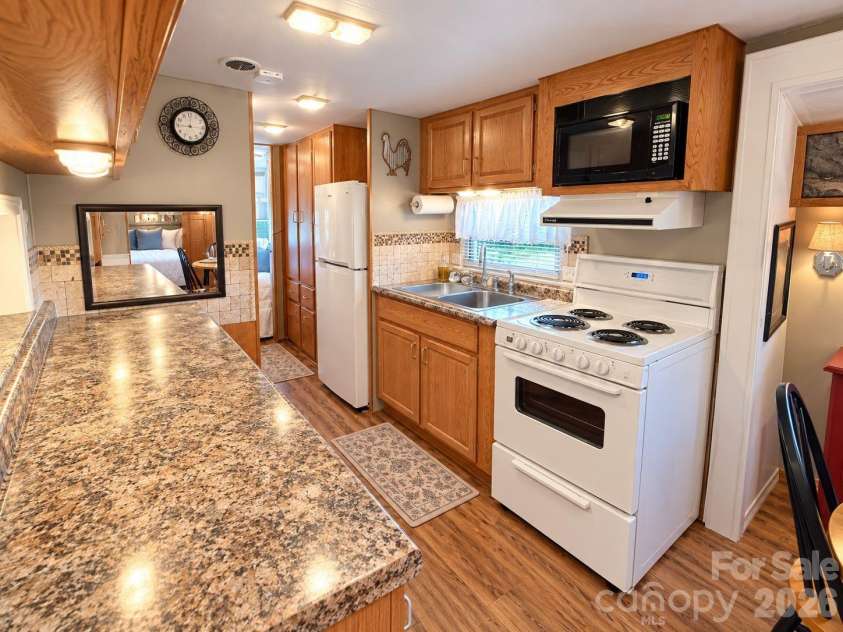 309 Lake Tillery Trail, Mount Gilead, NC 27306.  MLS# CAR4422182, YatesRealty ID 49233. 
