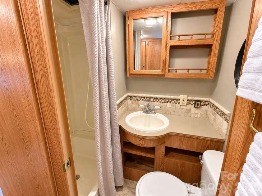 309 Lake Tillery Trail, Mount Gilead, NC 27306.  MLS# CAR4422182, YatesRealty ID 49233. 