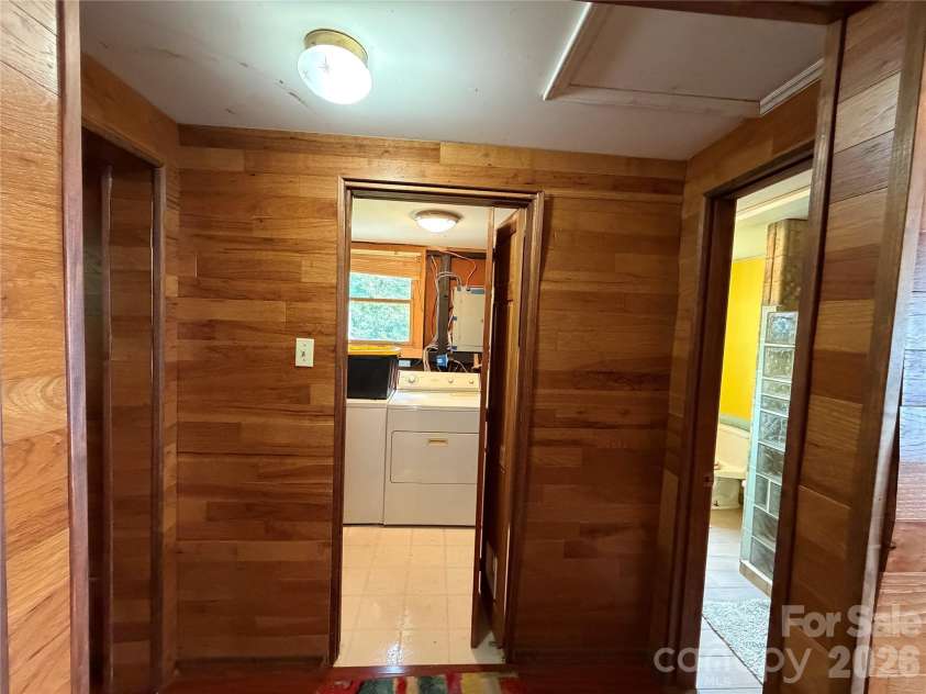 484 Alpine Drive, Little Switzerland, NC 28749.  MLS# CAR4415396, YatesRealty ID 49237. Laundry room