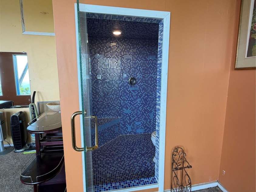 484 Alpine Drive, Little Switzerland, NC 28749.  MLS# CAR4415396, YatesRealty ID 49237. Lower floor bathroom