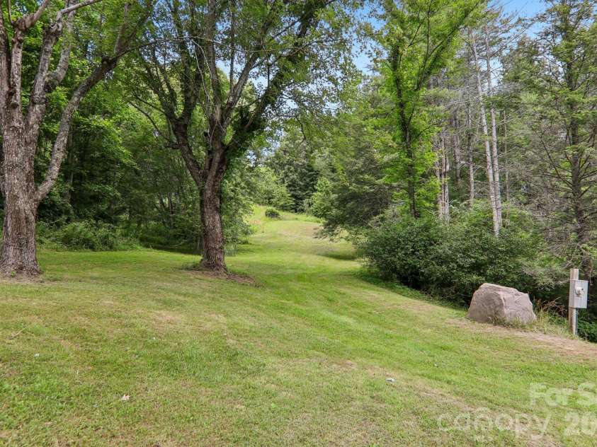 164 Pegg Road, Marshall, NC 28753.  MLS# CAR4417491, YatesRealty ID 49238. Back yard