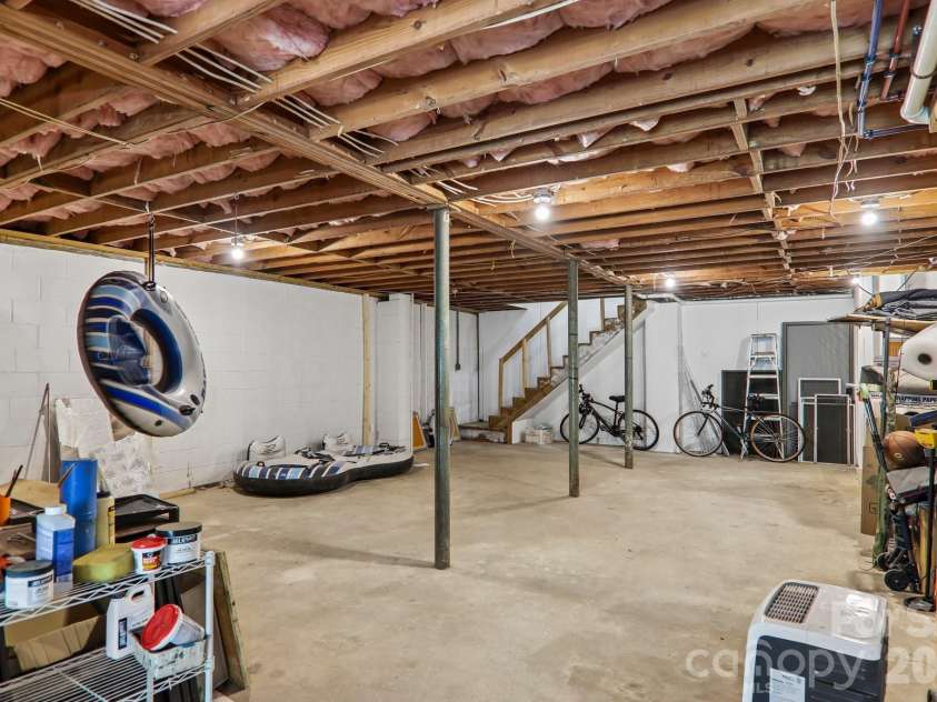 164 Pegg Road, Marshall, NC 28753.  MLS# CAR4417491, YatesRealty ID 49238. Unfinished garage