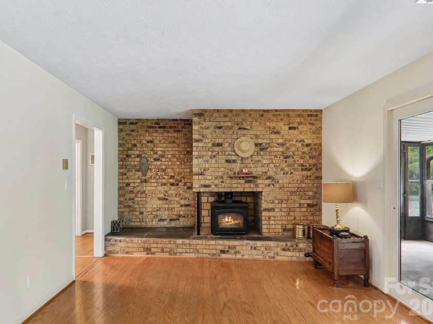 164 Pegg Road, Marshall, NC 28753.  MLS# CAR4417491, YatesRealty ID 49238. Wood burning fireplace