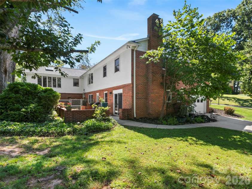 101 Castlerock Drive, Asheville, NC 28806.  MLS# CAR4418142, YatesRealty ID 49239. View from the side