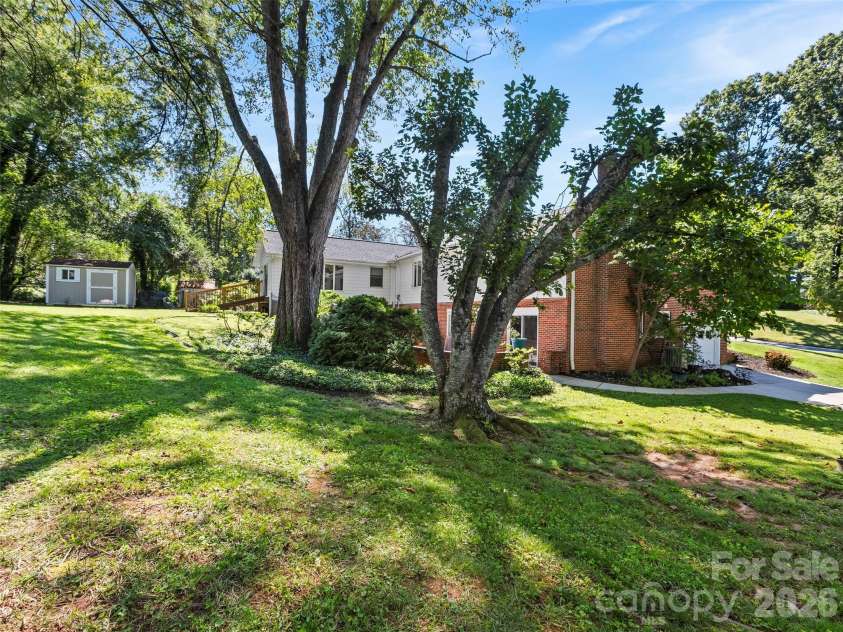 101 Castlerock Drive, Asheville, NC 28806.  MLS# CAR4418142, YatesRealty ID 49239. View from the side