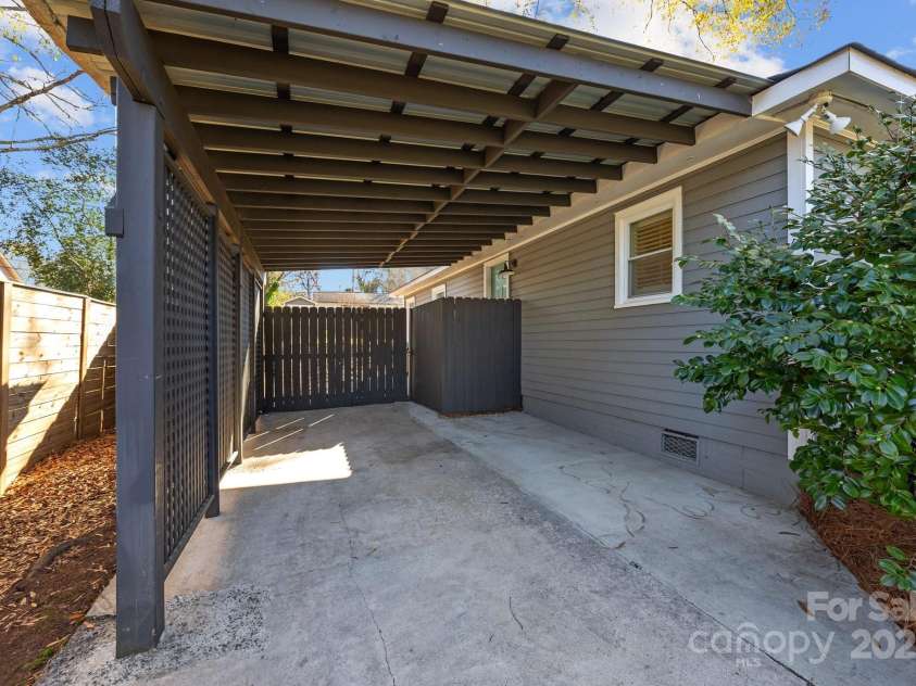 106 Turner Avenue, Charlotte, NC 28216.  MLS# CAR4243777, YatesRealty ID 4924. Carport