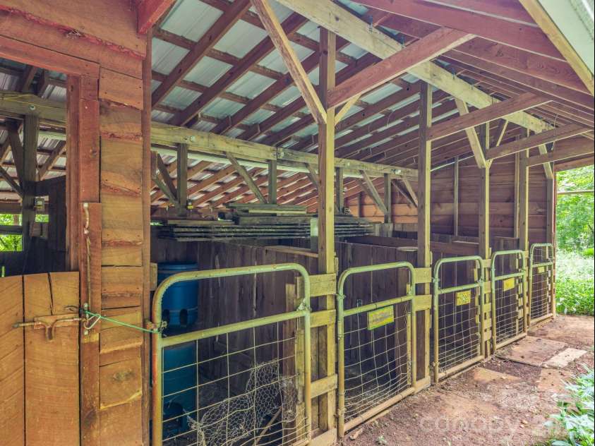 136 Limousine Lane, Pisgah Forest, NC 28768.  MLS# CAR4416612, YatesRealty ID 49241. 5 Stall goat barn