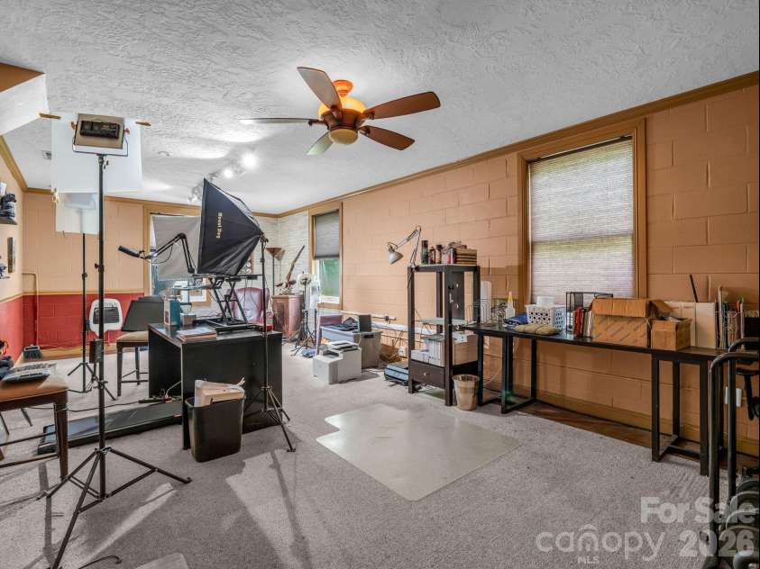 136 Limousine Lane, Pisgah Forest, NC 28768.  MLS# CAR4416612, YatesRealty ID 49241. A home office away from the main level