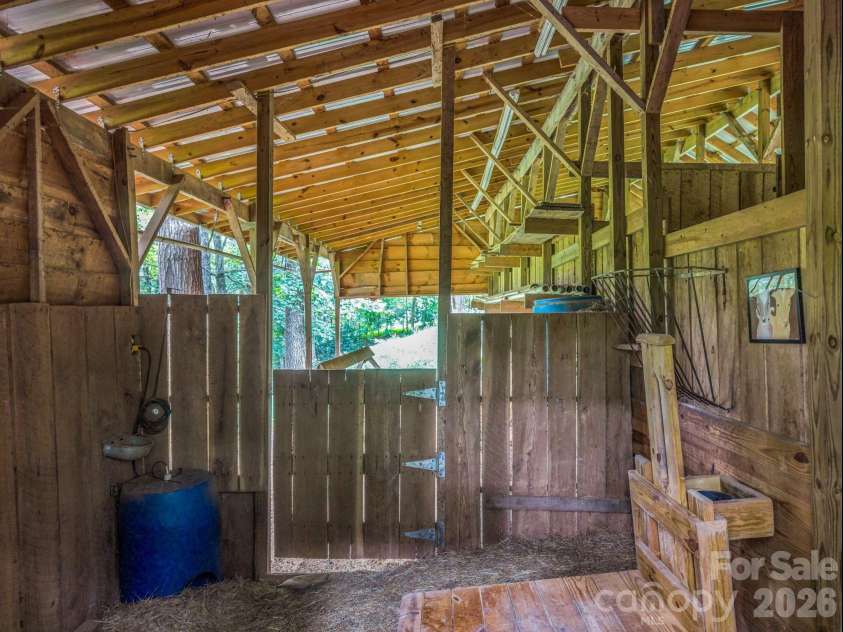 136 Limousine Lane, Pisgah Forest, NC 28768.  MLS# CAR4416612, YatesRealty ID 49241. Goat milking barn