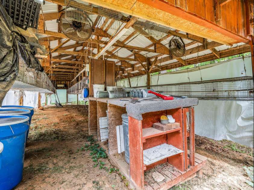 136 Limousine Lane, Pisgah Forest, NC 28768.  MLS# CAR4416612, YatesRealty ID 49241. Huge meat rabbit operation