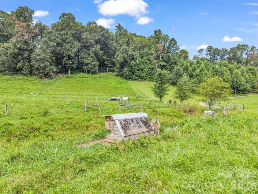 136 Limousine Lane, Pisgah Forest, NC 28768.  MLS# CAR4416612, YatesRealty ID 49241. Pasture with some livestock shelters