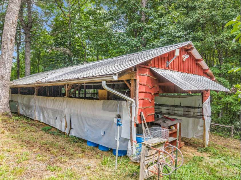 136 Limousine Lane, Pisgah Forest, NC 28768.  MLS# CAR4416612, YatesRealty ID 49241. Rabbit barn used to raise meat rabbits