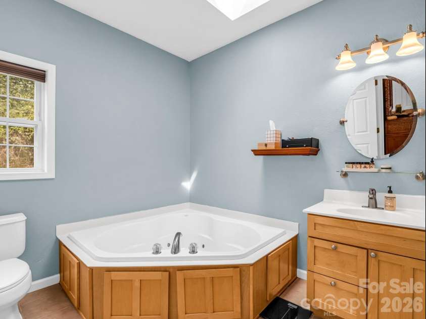 136 Limousine Lane, Pisgah Forest, NC 28768.  MLS# CAR4416612, YatesRealty ID 49241. The second primary bath