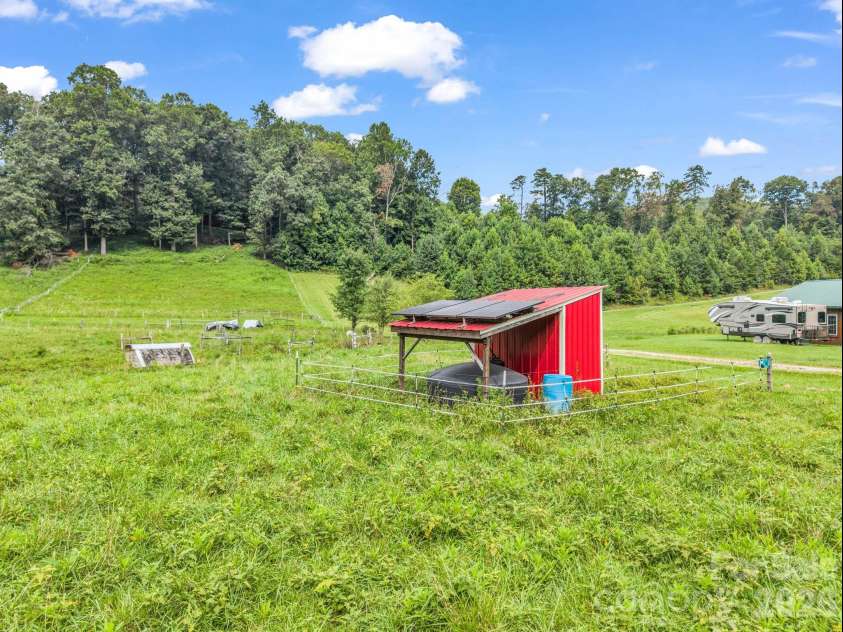 136 Limousine Lane, Pisgah Forest, NC 28768.  MLS# CAR4416612, YatesRealty ID 49241. Well hut, this well is solar powered