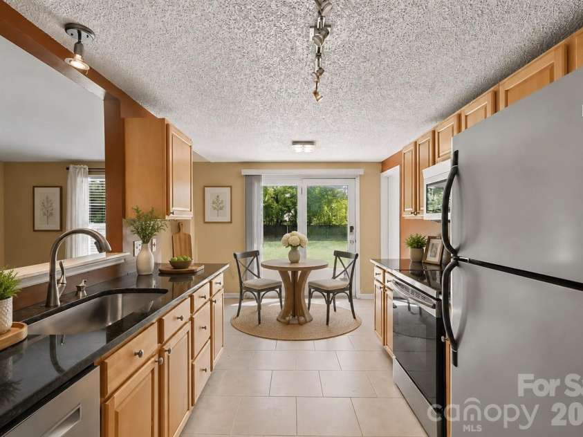 3001 Old House Circle, Matthews, NC 28105.  MLS# CAR4415033, YatesRealty ID 49255. Al-Enhanced, virtually-staged photo
