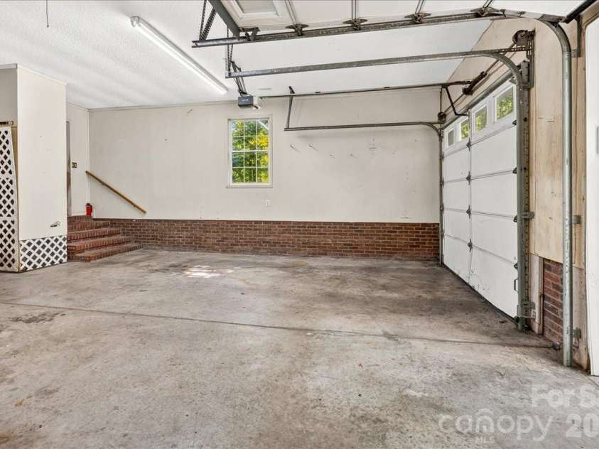 6712 Mexico Road, Concord, NC 28025.  MLS# CAR4400821, YatesRealty ID 49257. 2 car garage.