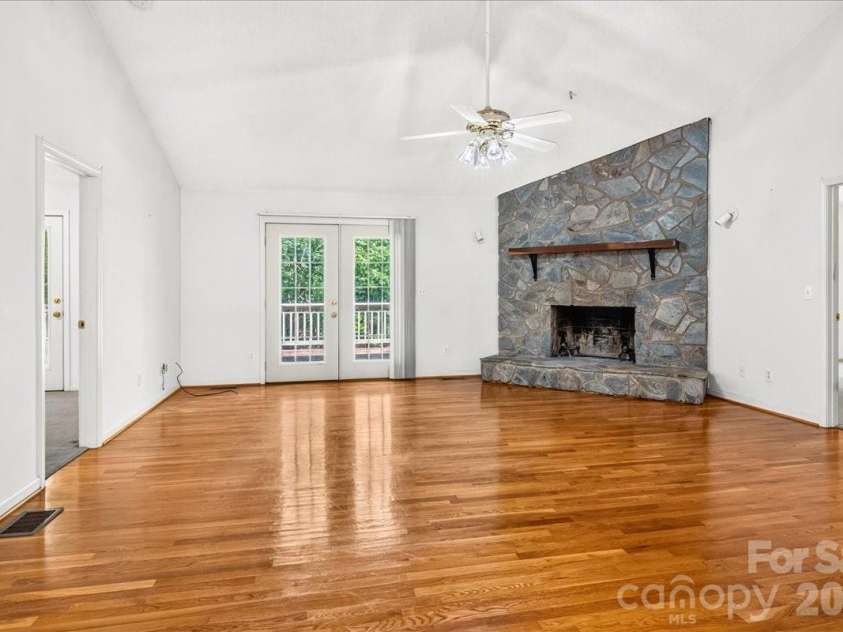 6712 Mexico Road, Concord, NC 28025.  MLS# CAR4400821, YatesRealty ID 49257. Living Room with Fireplace.