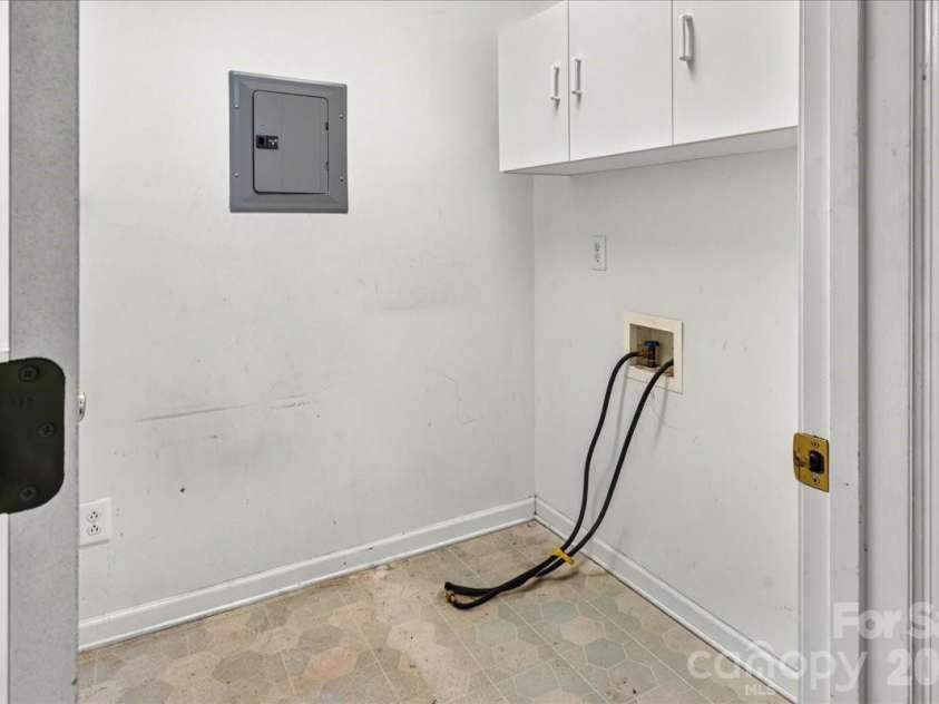6712 Mexico Road, Concord, NC 28025.  MLS# CAR4400821, YatesRealty ID 49257. Separate laundry room off of the kitchen.