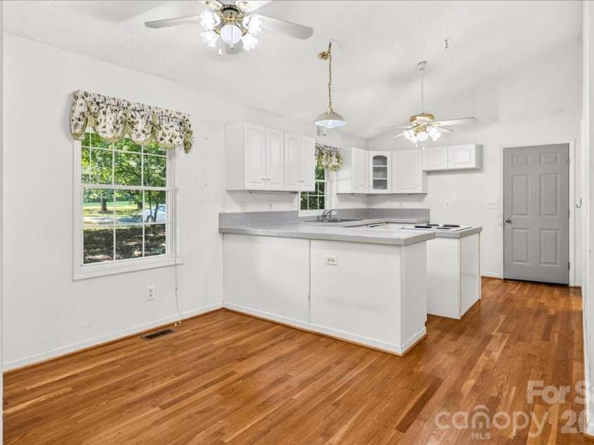 6712 Mexico Road, Concord, NC 28025.  MLS# CAR4400821, YatesRealty ID 49257. Window and kitchen and dining area.