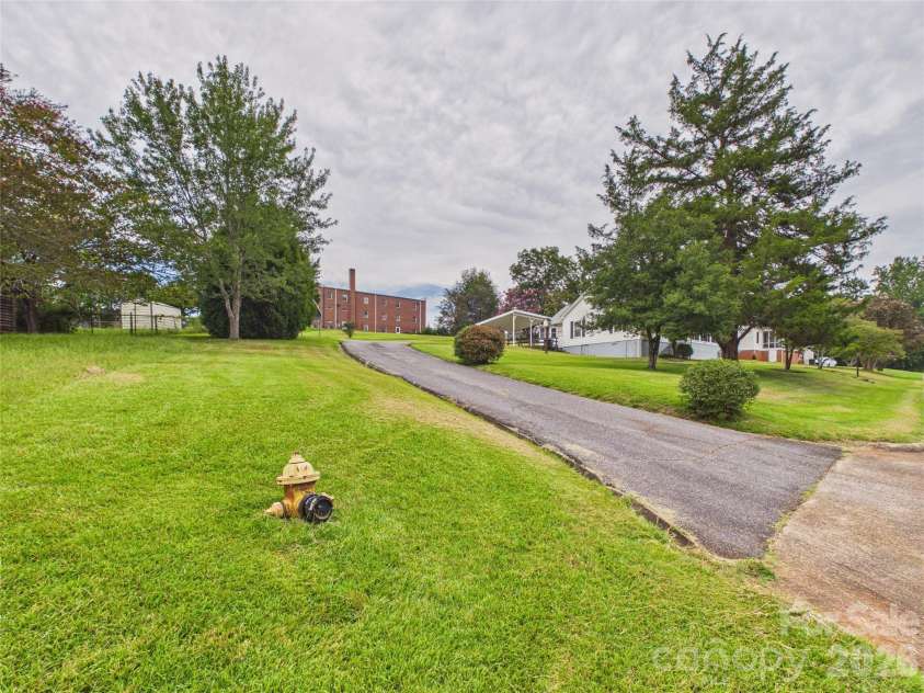 107 Mimosa Avenue, Rhodhiss, NC 28630.  MLS# CAR4421754, YatesRealty ID 49271. 
