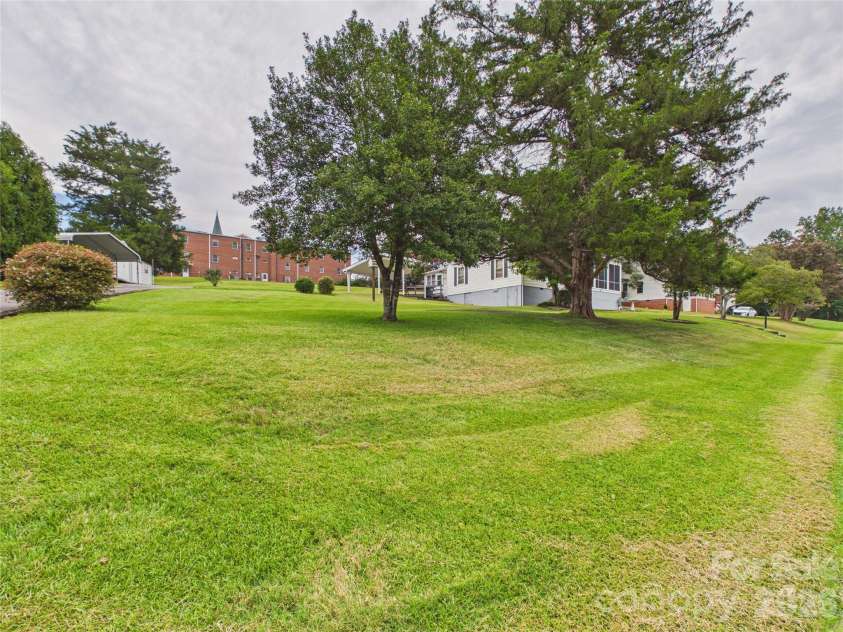 107 Mimosa Avenue, Rhodhiss, NC 28630.  MLS# CAR4421754, YatesRealty ID 49271. 