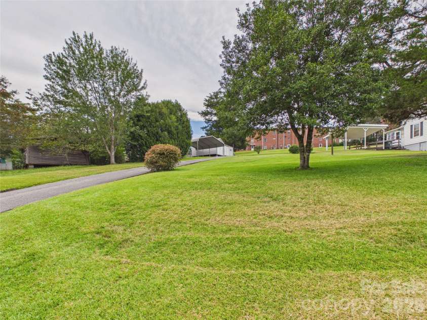 107 Mimosa Avenue, Rhodhiss, NC 28630.  MLS# CAR4421754, YatesRealty ID 49271. 