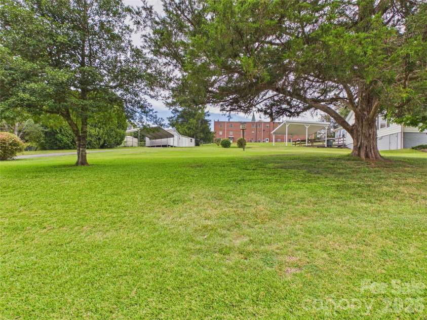 107 Mimosa Avenue, Rhodhiss, NC 28630.  MLS# CAR4421754, YatesRealty ID 49271. 