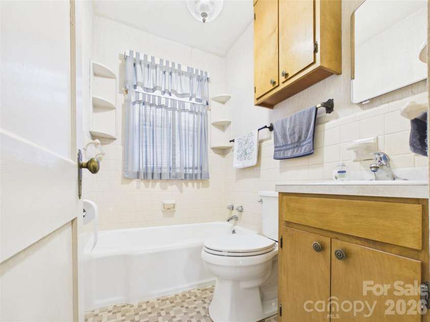 107 Mimosa Avenue, Rhodhiss, NC 28630.  MLS# CAR4421754, YatesRealty ID 49271. 