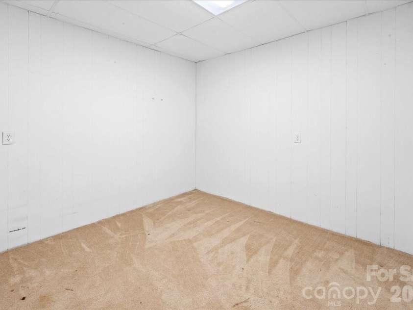 705 Brunson Drive, Albemarle, NC 28001.  MLS# CAR4422232, YatesRealty ID 49272. Additional basement room with a closet.