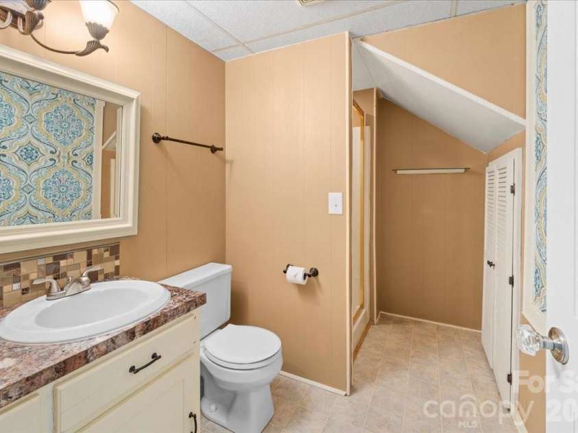 705 Brunson Drive, Albemarle, NC 28001.  MLS# CAR4422232, YatesRealty ID 49272. Full Bathroom in the Basement.