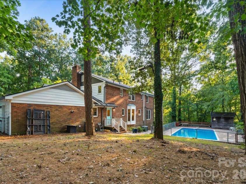 705 Brunson Drive, Albemarle, NC 28001.  MLS# CAR4422232, YatesRealty ID 49272. Pool is fenced in.