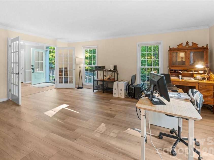 705 Brunson Drive, Albemarle, NC 28001.  MLS# CAR4422232, YatesRealty ID 49272. The living room is spacious.  Nice entertaining space.