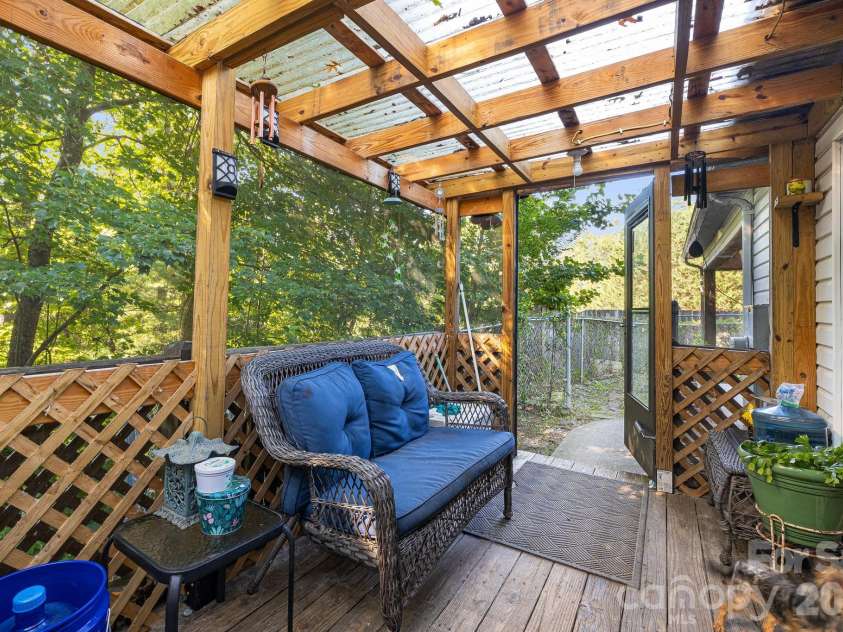 96 Fallswood Court, Hendersonville, NC 28739.  MLS# CAR4422218, YatesRealty ID 49273. Covered back deck