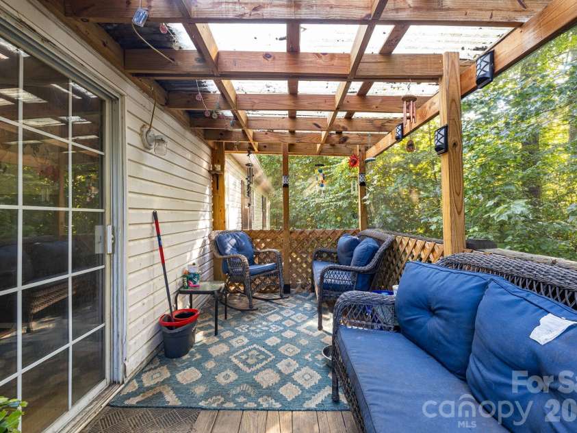 96 Fallswood Court, Hendersonville, NC 28739.  MLS# CAR4422218, YatesRealty ID 49273. Covered back deck