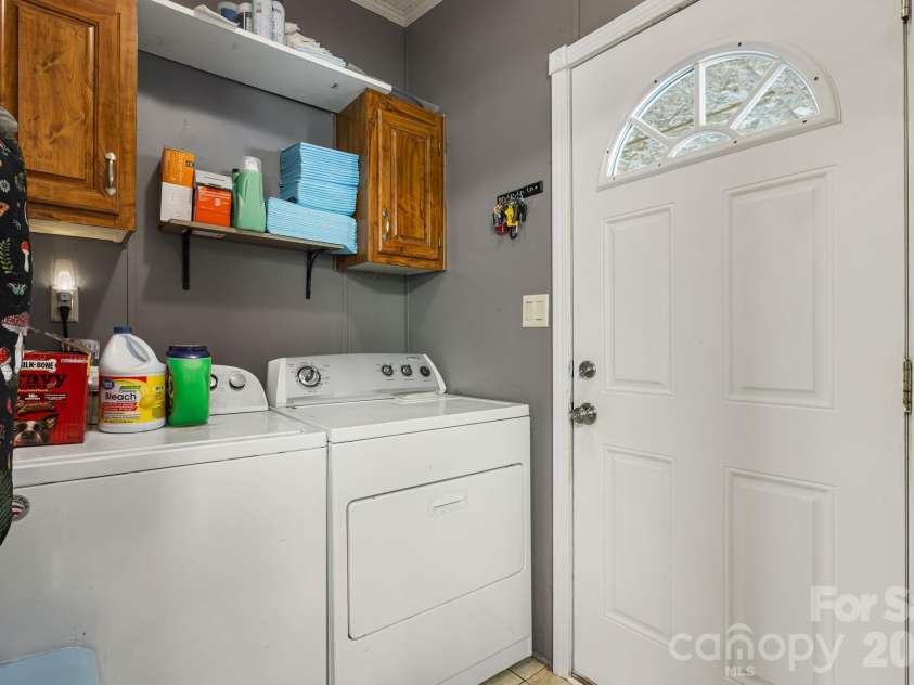 96 Fallswood Court, Hendersonville, NC 28739.  MLS# CAR4422218, YatesRealty ID 49273. Laundry Room