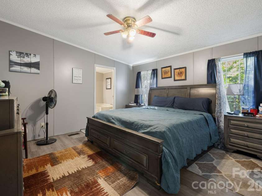 96 Fallswood Court, Hendersonville, NC 28739.  MLS# CAR4422218, YatesRealty ID 49273. Primary Bedroom