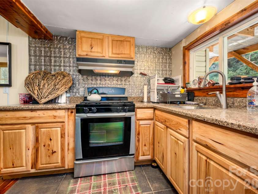 1008 Hardison Falls Trail, Hendersonville, NC 28792.  MLS# CAR4417588, YatesRealty ID 49276. 