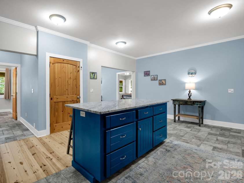 119 Mountain Bluff Trail, Hendersonville, NC 28792.  MLS# CAR4422233, YatesRealty ID 49280. Breakfast bar with storage, door to lower level