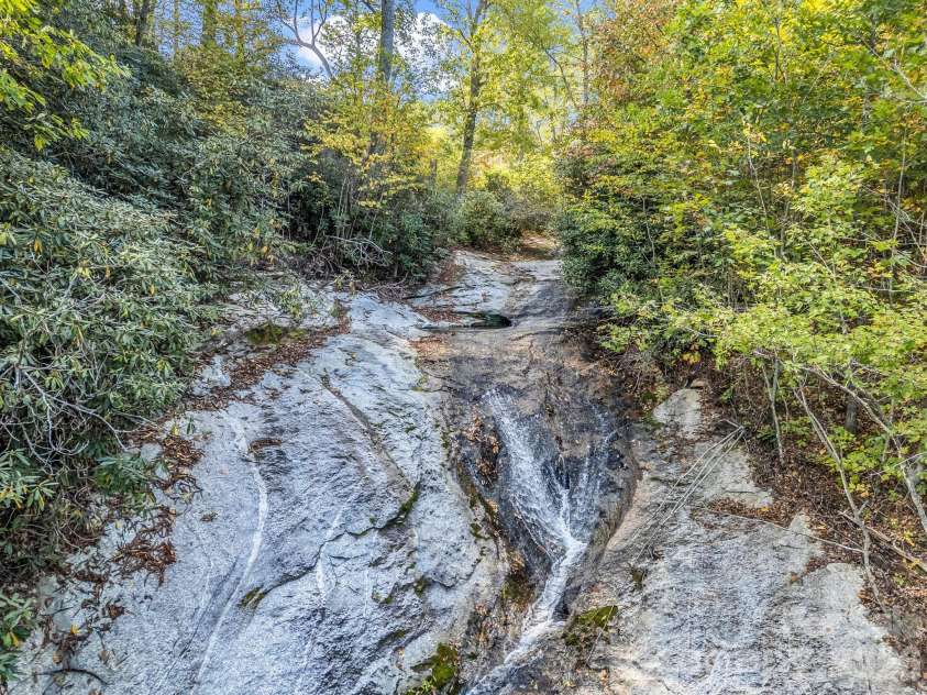 119 Mountain Bluff Trail, Hendersonville, NC 28792.  MLS# CAR4422233, YatesRealty ID 49280. Gentle lead to falls