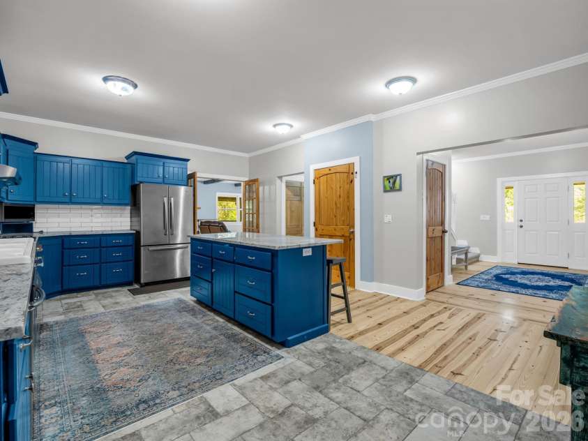 119 Mountain Bluff Trail, Hendersonville, NC 28792.  MLS# CAR4422233, YatesRealty ID 49280. Kitchen across - west facing entrance