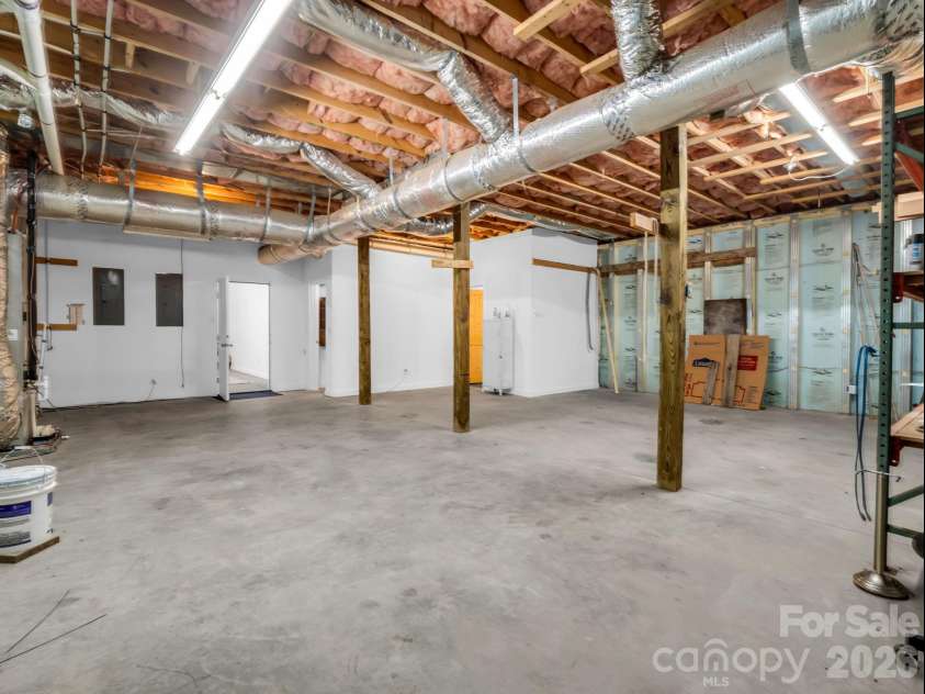 119 Mountain Bluff Trail, Hendersonville, NC 28792.  MLS# CAR4422233, YatesRealty ID 49280. Tons of unfinished basement storage
