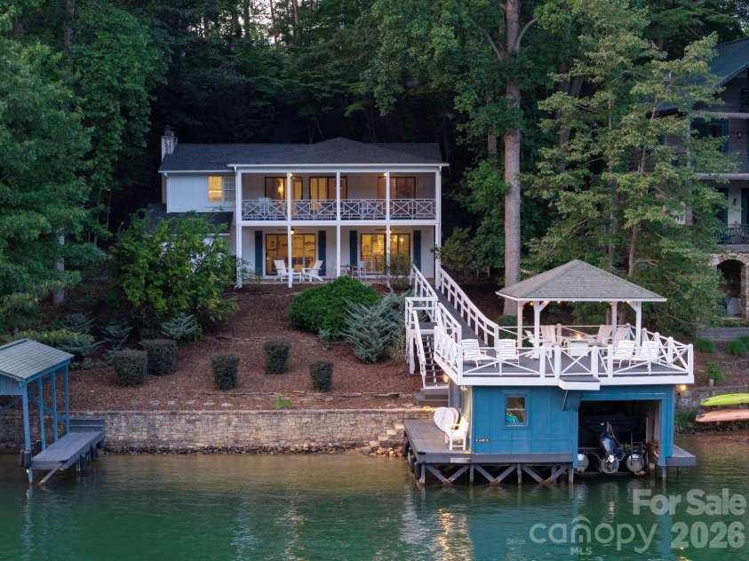 183 Blarney Road, Lake Lure, NC 28746.  MLS# CAR4326369, YatesRealty ID 49285. Double boathouse with private beach area