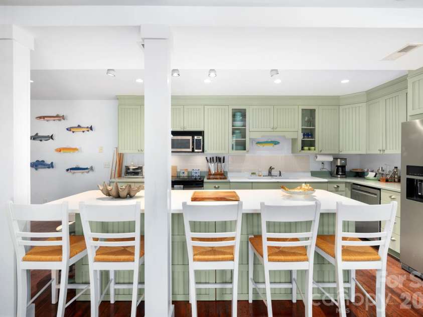 183 Blarney Road, Lake Lure, NC 28746.  MLS# CAR4326369, YatesRealty ID 49285. Island with breakfast seating