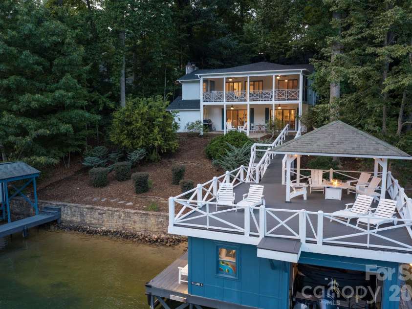 183 Blarney Road, Lake Lure, NC 28746.  MLS# CAR4326369, YatesRealty ID 49285. Newer Trek decking on boathouse